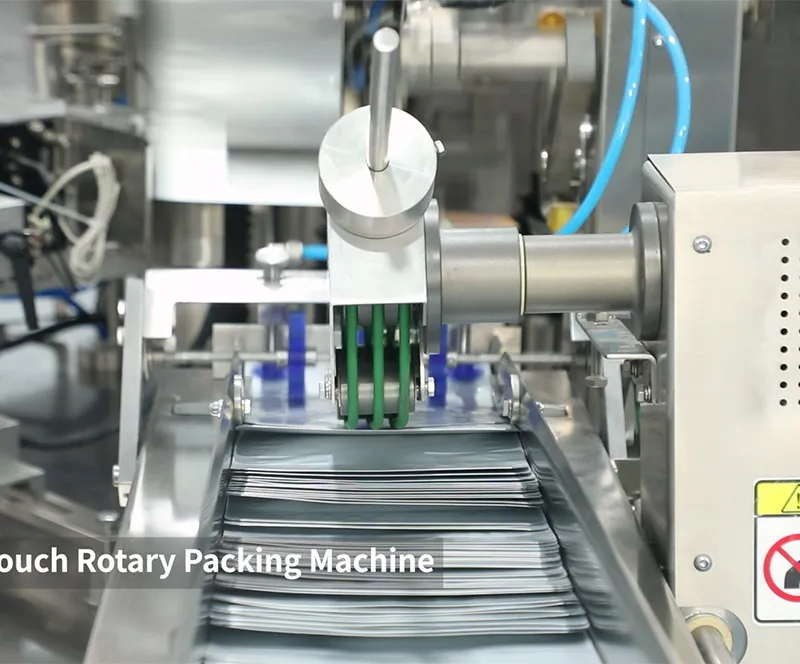 WanHong rotary premade pouch machine in operation – clean, compact, with quick‑change parts visible